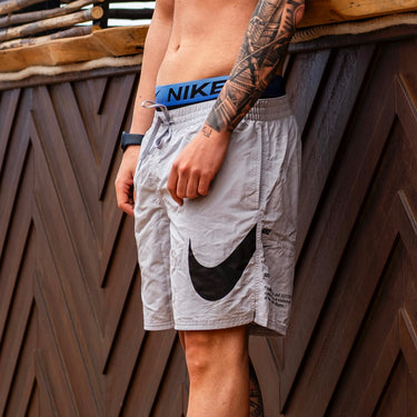 nike costume scritte