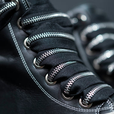 Theater rick mid pelle laccio zip